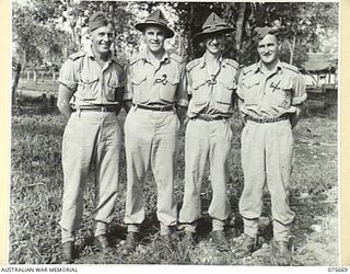 LAE, NEW GUINEA. 1944-09-04. FOUR NEW ZEALAND SCIENTISTS FROM THE C.S.I.R. (COUNCIL FOR SCIENTIFIC AND INDUSTRIAL RESEARCH) NEW ZEALAND WHO ARE ON LOAN TO THE AUSTRALIAN MILITARY FORCES AND ..