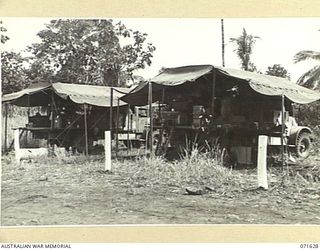 LAE, NEW GUINEA. 1944-02-24. THE MOBILE INSTRUMENT SECTION AND THE MOBILE WIRELSS SECTION TRUCKS, 2/125TH BRIGADE WORKSHOP ATTACHED TO THE 7TH DIVISION