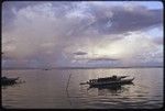 Manus: canoes in lagoon south of Pere, in late afternoon