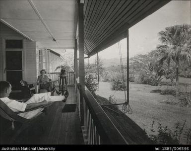 People sitting on their veranda