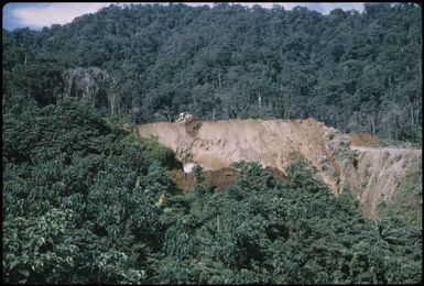 Disposing of the overburden: filling a valley, Arawa (2) : Bougainville Island, Papua New Guinea, April 1971 / Terence and Margaret Spencer