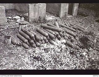 RABAUL, NEW BRITAIN, 1946-01-21. SECTION OF THE JAPANESE NAVAL COMPRESSOR STATION ON TAWUI POINT. THE INSTALLATION PRODUCED COMPRESSED AIR WHICH WAS USED FOR FILLING TORPEDOES
