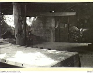 PORT MORESBY, PAPUA, NEW GUINEA. 1944-03-27. NO 1 GUN EMPLACEMENT PAGA BATTERY, COAST ARTILLERY VIEWED FROM THE RIGHT OF THE GUN FLOOR AND SHOWING INTERIOR CONSTRUCTION OF THE OVERHEAD COVER