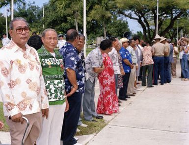 Former members of the Guam Combat Patrol, established in October, 1944, and disbanded in August, 1946, await presentation of the Asiatic-Pacific Campaign Medal and the World War II Victory Medal during a Veteran's Day memorial service at Skinner Plaza