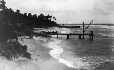 Beach and wharf at Uma village, near Sydney Point, Banaba, Kiribati