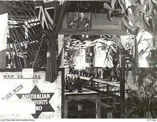 LAE BASE AREA, NEW GUINEA. 1944-12-24. THE INTERIOR OF NO.2 OTHER RANKS MESS WHICH WON THE PRIZE FOR THE BEST DECORATED MESS IN THE FIRST AUSTRALIAN ARMY MESS