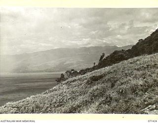 FORTIFICATION POINT, NEW GUINEA. 1944-03-21. VIEWING SOUTH FROM FORTIFICATION POINT ACROSS THE MOUTH OF THE MASAWENG RIVER, FROM WITHIN THE AREA OF HEADQUARTERS, 2ND AUSTRALIAN CORPS
