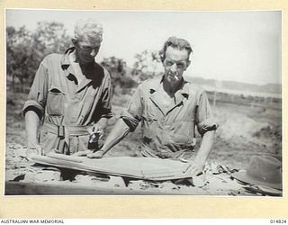 1943-05-10. NEW GUINEA. CIVIL CONSTRUCTION CORPS IN NEW GUINEA, THE C.C.C. WHICH HAS DONE INVALUABLE WORK IN AUSTRALIA'S WAR EFFORT IS NOW ON THE JOB IN NEW GUINEA. VOLUNTEERS FROM THE CORPS WERE ..