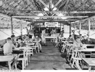 PORT MORESBY, NEW GUINEA. 1944-01-22. AN INTERIOR VIEW OF THE RECREATION HUT BUILT BY THE 2/101ST GENERAL TRANSPORT COMPANY IN THEIR CAMP AREA AND FURNISHED AND SUPPLIED WITH GAMES BY THE ..