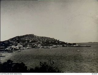 Port Moresby, Papua. Looking from the north side across the bay towards the harbour entrance, jetty and town
