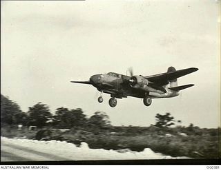 KIRIWINA, TROBRIAND ISLANDS, PAPUA. C. 1943-12. BOSTON BOMBER AIRCRAFT OF NO. 22 SQUADRON RAAF COMING IN TO LAND AFTER HAVING BOMBED AND STRAFED A JAPANESE BASE AT GASMATA