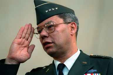 GEN Colin Powell, chairman of the Joint Chiefs of STAFF, slautes during the Sunset Ceremony for Pearl Harbor survivors at t he Arizona Memorial Visitores Center. The ceremony is part of day-long observances commemorating the 50th anniversary of the Japanese attack on Pearl Harbor