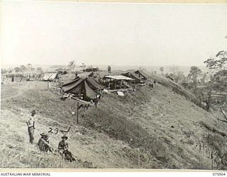 HANSA BAY AREA, NEW GUINEA. 1944-09-05. THE CAMP SITE OF NO. 8 PLATOON, A COMPANY 25TH INFANTRY BATTALION SITUATED ON VERY HIGH GROUND. THE MOUTH OF THE SEKULA RIVER CAN BE SEEN IN THE DISTANCE. ..