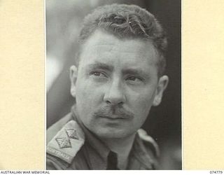 MILILAT, NEW GUINEA. 1944. NX15943 LIEUTENANT J.S. CLEARY, OFFICER- IN- CHARGE, FIELD TEAM, MILITARY HISTORY SECTION