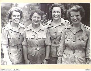 BRISBANE, QLD. 1945-02-21. AUSTRALIAN ARMY MEDICAL WOMEN'S SERVICE REINFORCEMENTS AT FRAZER'S PADDOCK BEFORE THEIR EMBARKATION TO THE 2/1 GENERAL HOSPITAL AT BOUGAINVILLE. IDENTIFIED PERSONNEL ..