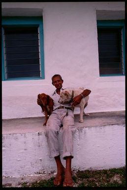 Man with dogs, Niue