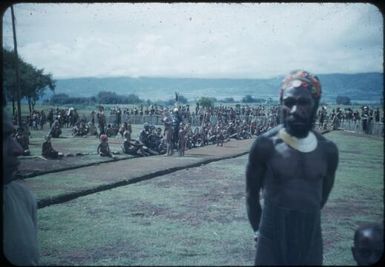 People waiting for medical inspection (Aviamp and Kerowil), a bearded man in the foreground : Wahgi Valley, Papua New Guinea, 1954 and 1955 / Terence and Margaret Spencer