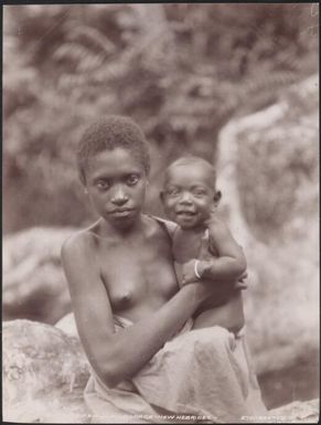 A young woman holding a baby, Raga, New Hebrides, 1906 / J.W. Beattie