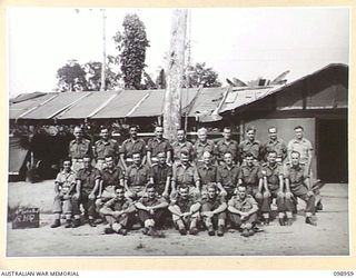 TOROKINA, BOUGAINVILLE. 1945-11-21. MEMBERS OF THE ADMINISTRATIVE GROUP, HEADQUARTERS 4 FIELD REGIMENT. THE REGIMENT SERVED WITH DISTINCTION IN THE RECENT BOUGAINVILLE CAMPAIGN