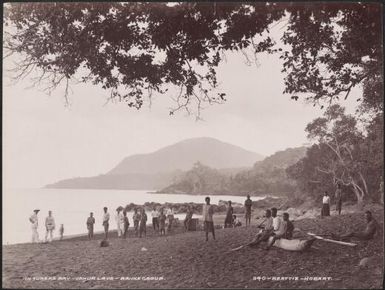 Missionaries and local people on a beach at Vureas bay, Vanua Lava, Banks Islands, 1906 / J.W. Beattie