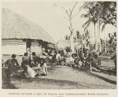 Natives outside a hut in which the Commissioners were holding a fono