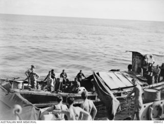 KAVIENG, NEW IRELAND, 1945-10-21. AN AUSTRALIAN NEW GUINEA ADMINISTRATIVE UNIT (ANGAU) ADMINISTRATIVE HEADQUARTERS WAS SET UP IN THE KAVIENG AREA WITH CAPTAIN F. N. W. SHAND, ANGAU DISTRICT ..