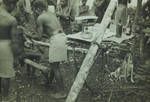 Medical orderly giving 'shoot' [sic] on patrol, Border Mountains (Iuri territory), [Papua New Guinea], Nov to Dec 1954