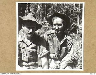 NEW GUINEA, 1943-07-27. NX90100 PRIVATE O. J. CANTOR (LEFT) AND VX43612 PRIVATE H. D. GOLDRING (RIGHT) OF "D" COMPANY, 2/5TH BATTALION
