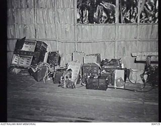 SEGI AREA, NEW GEORGIA, BRITISH SOLOMON ISLANDS PROTECTORATE. C.1943. AMERICAN AND JAPANESE WIRELESS TELEGRAPHY EQUIPMENT SALVAGED FROM CRASHED AIRCRAFT. (NAVAL HISTORICAL COLLECTION)