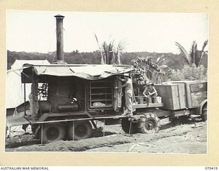 WUNUNG PLANTATION, JACQUINOT BAY, NEW BRITAIN. 1945-03-02. "DOODLE- BUG" THE MOBILE DISINFECTION PLANT IN POSITION AT THE 105TH CASUALTY CLEARING STATION