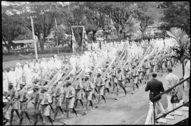 Police marching on parade, Rabaul, New Guinea, ca. 1929 / Sarah Chinnery