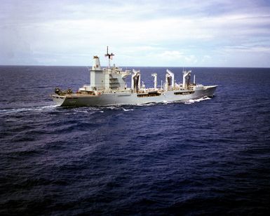 A starboard view of the fleet oiler USS CIMARRON (AO 177) underway