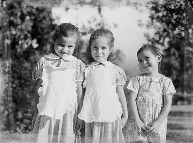 [Group portrait of three sisters]