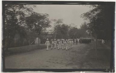 Naval band of the Australian Naval and Military Expeditionary Force leading parade, Rabaul, New Guinea, 1914, 1