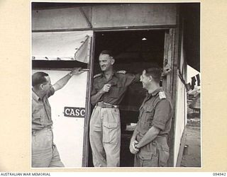 CAPE WOM, WEWAK AREA, NEW GUINEA. 1945-08-07. MAJOR D.E. PATTERSON, OFFICER- IN- CHARGE OF ALL MOTOR TRANSPORT (2), WITH LIEUTENANT COLONEL J. TALBOT, COMMANDER AUSTRALIAN ARMY SERVICE CORPS, 6 ..