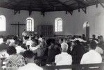 People attending the presentation of Rev. Horwell at a church