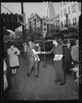 Selling newspapers in Little Tokyo, Los Angeles, 1941