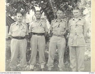 LAE, NEW GUINEA. 1944-08-28. OFFICERS OF HEADQUARTERS, NEW GUINEA FORCE. IDENTIFIED PERSONNEL ARE: NX103002 CAPTAIN G.W. WEBSDALE (1); NX111871 MAJOR W.A.H. JENNER, DEPUTY ASSISTANT MILITARY ..