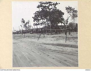 WIRUI BEACH, WEWAK AREA, NEW GUINEA. 1945-09-05. THE TENT LINES OF 2/11 INFANTRY BATTALION, ON THE BEACH