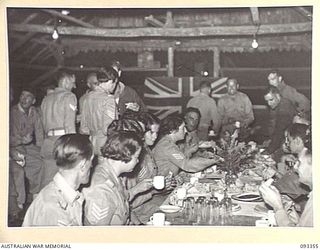 LAE AREA, NEW GUINEA, 1945-06-30. A VIEW OF THE SUPPER TABLE AT THE SERGEANT'S MESS DURING A DANCE HELD BY 112 CONVALESCENT DEPOT