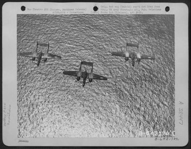 Northrop P-61 "Black Widows" In Flight. Saipan, Mariansa Islands, January 1945. (U.S. Air Force Number B64217AC)