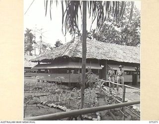 LAE, NEW GUINEA. 1944-08-19. THE STORES AND TRANSPORT OFFICE, HEADQUARTERS, NEW GUINEA FORCE. IDENTIFIED PERSONNEL ARE:- VX108086 CAPTAIN W.B. BALLARD, ADJUTANT (1); NX98562 WARRANT OFFICER II, ..