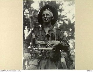 DANMAP RIVER AREA, NEW GUINEA. 1945-01-01. GUNNER MORAN, 2/3RD FIELD REGIMENT, EQUIPPED AND READY TO MOVE OUT ON A JUNGLE PATROL