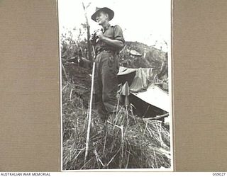 FARIA VALLEY, NEW GUINEA, 1943-10-17. WX1598 LIEUTENANT COLONEL F. H. SUBLET, MC., COMMANDING OFFICER 2/16TH AUSTRALIAN INFANTRY BATTALION, AT CAMP AT JOHN'S KNOLL