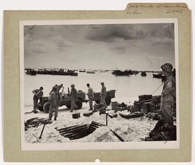 Jeep Swigs Down a Drink on Beach of Charon-Kanoa