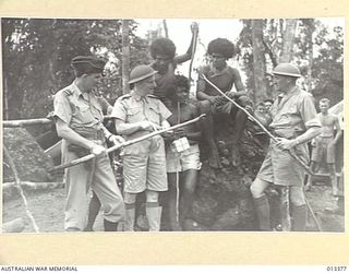 1942-10-08. AIR VICE MARSHAL G. JONES; AIR MINISTER MR DRAKEFORD, AND MR COLES, M.H.R. ARE INTERESTED IN NATIVE WALKING STOCKS. (NEGATIVE BY BOTTOMLEY)