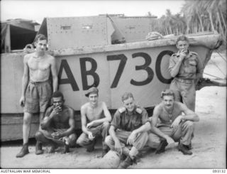 SORAKEN AREA, BOUGAINVILLE, 1945-06-12. MEMBERS OF 42 LANDING CRAFT COMPANY WHO PLAYED A HEROIC PART IN EVACUATING 31/51 INFANTRY BATTALION TROOPS FROM PORTON PLANTATION. PICTURED ARE THE CREW OF ..