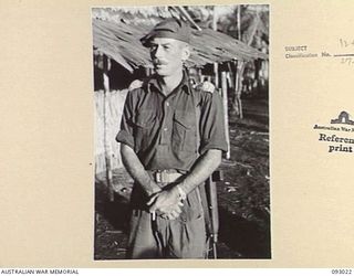 MOROKAIMORO, BOUGAINVILLE, 1945-06-07. MAJ N.I. WINNING, COMMANDING OFFICER, 2/8 COMMANDO SQUADRON, OFFICER COMMANDING RAFFLES FORCE, SETTING OUT FROM THE SQUADRON HEADQUARTERS ON A RECONNAISSANCE ..