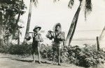 A Tahitian boy and a Chinese half-blood boy, sellers of Tahitian chestnuts (mape)