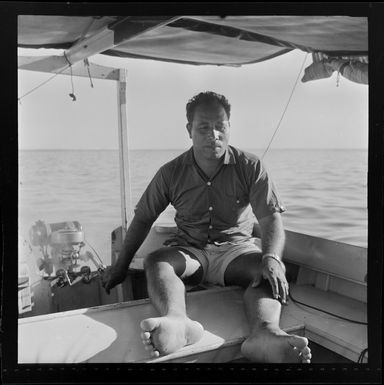 Unidentified man steering a power boat, Skylodge Hotel, Nadi, Fiji